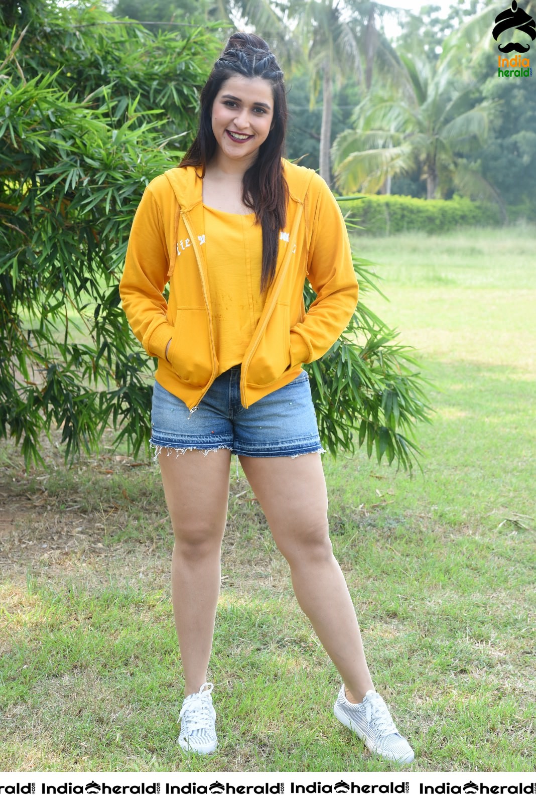 Mannara Chopra Hot Thighs Show in Sexy Shorts and Yellow Jerkin Set 1