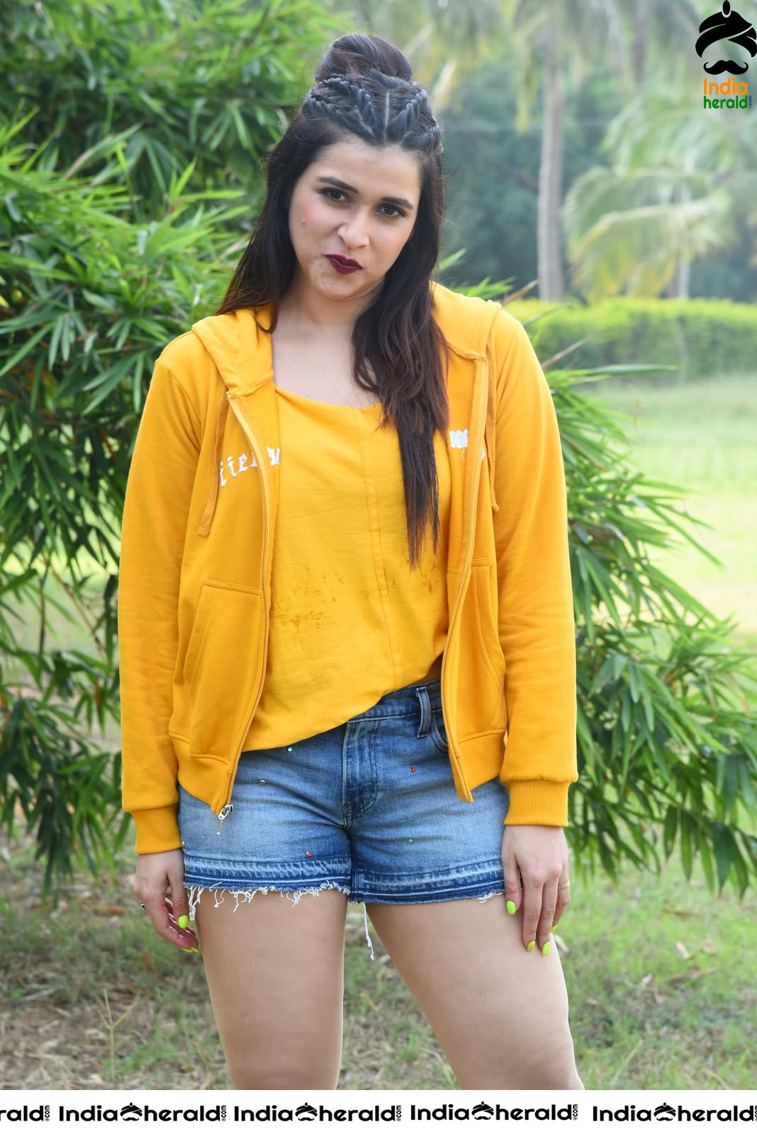 Mannara Chopra Hot Thighs Show in Sexy Shorts and Yellow Jerkin Set 1