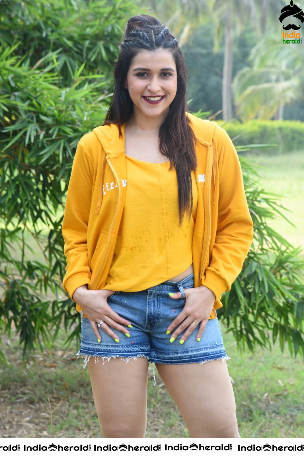 Mannara Chopra Hot Thighs Show in Sexy Shorts and Yellow Jerkin Set 1