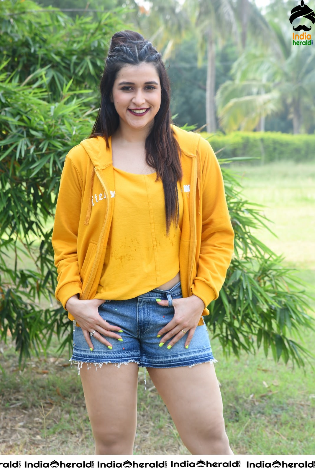 Mannara Chopra Hot Thighs Show in Sexy Shorts and Yellow Jerkin Set 1