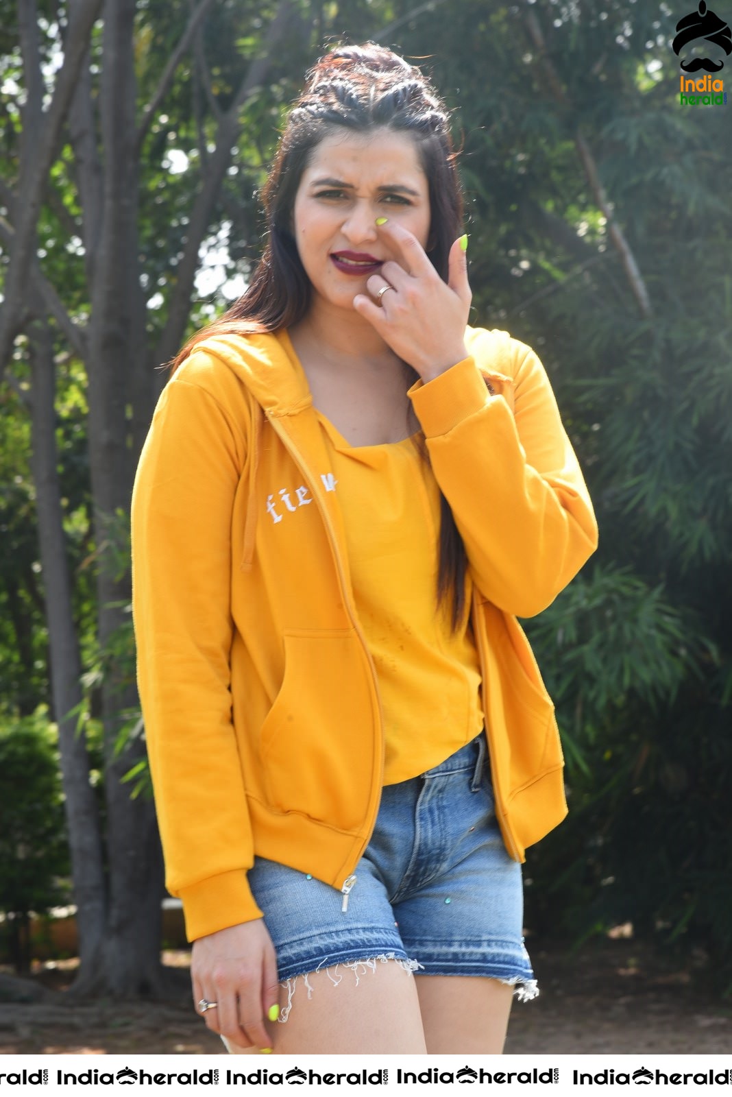 Mannara Chopra Hot Thighs Show in Sexy Shorts and Yellow Jerkin Set 2