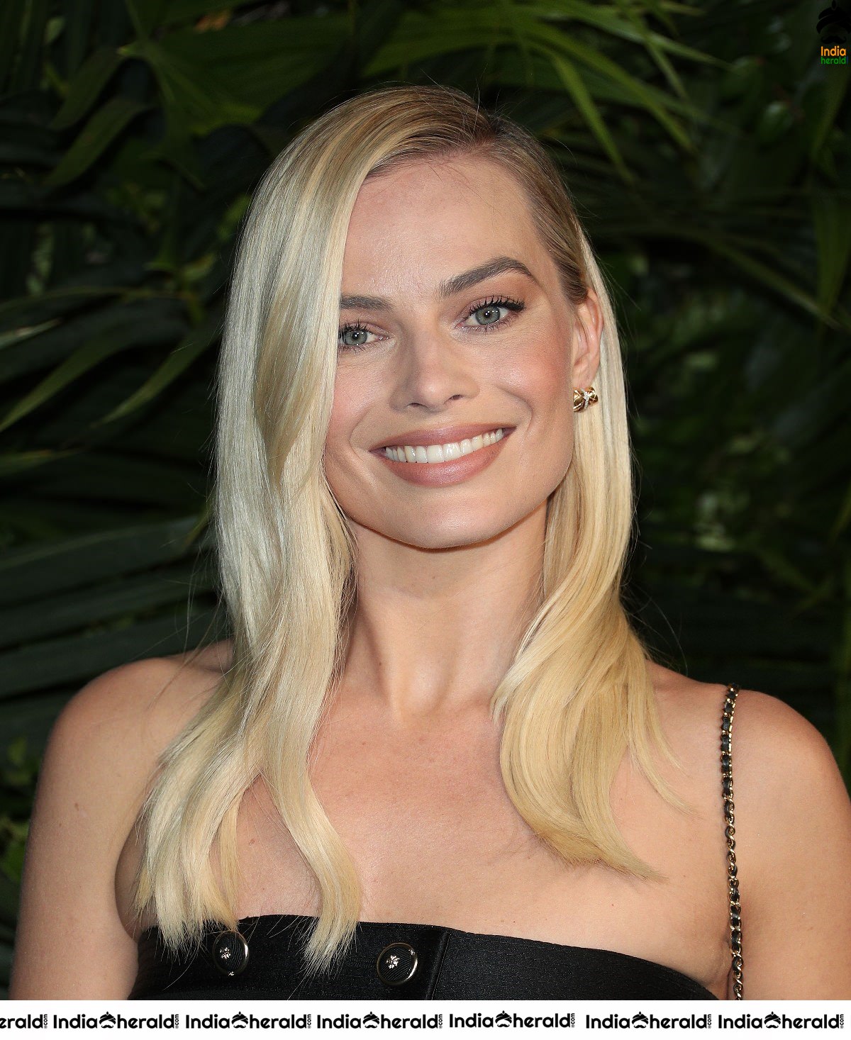 Margot Robbie In A Black Dress At An Event