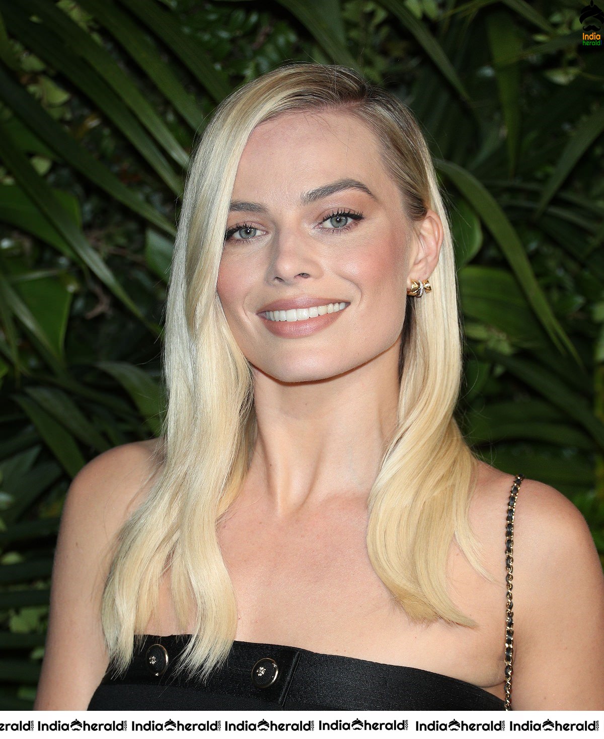 Margot Robbie In A Black Dress At An Event