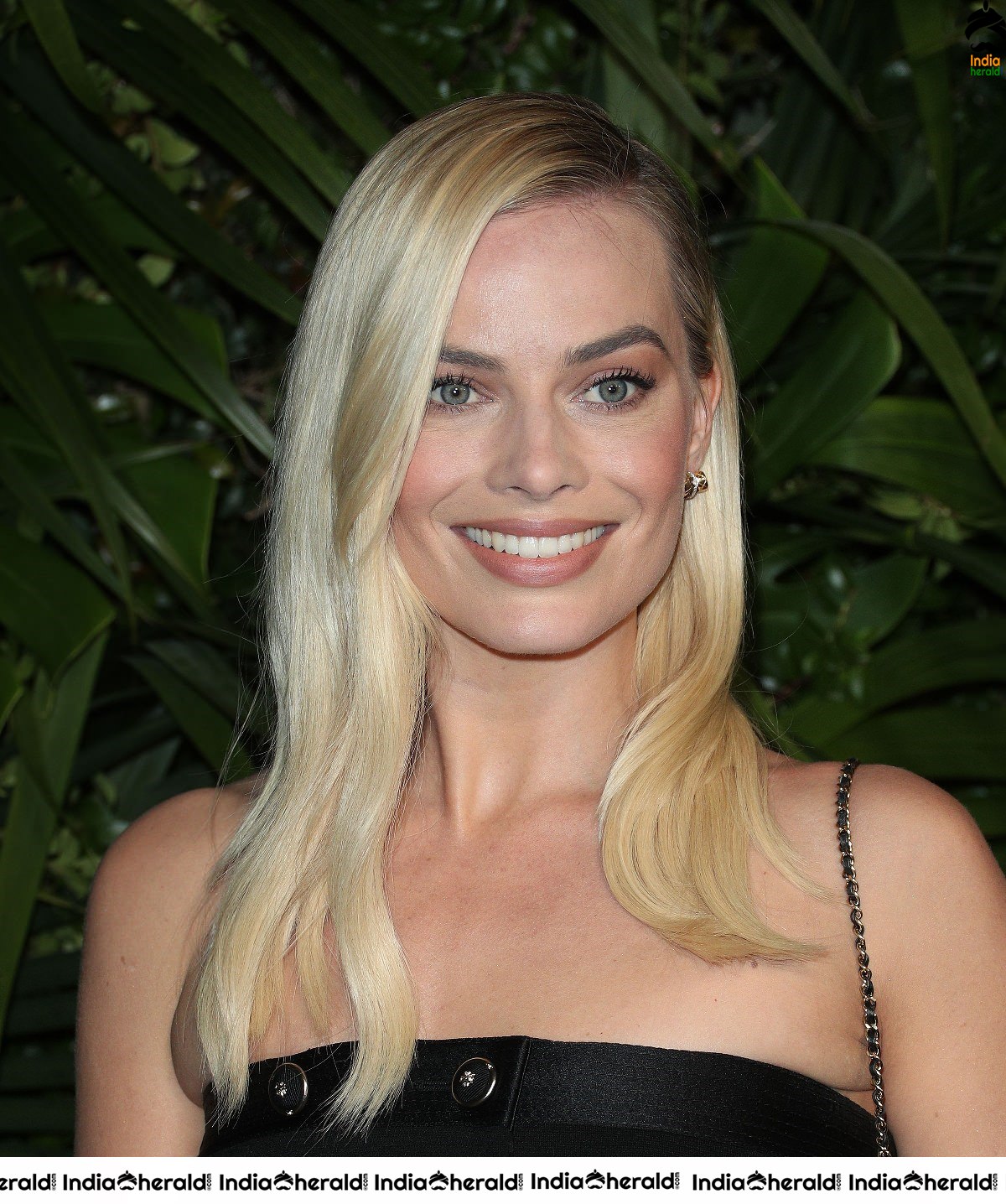 Margot Robbie In A Black Dress At An Event