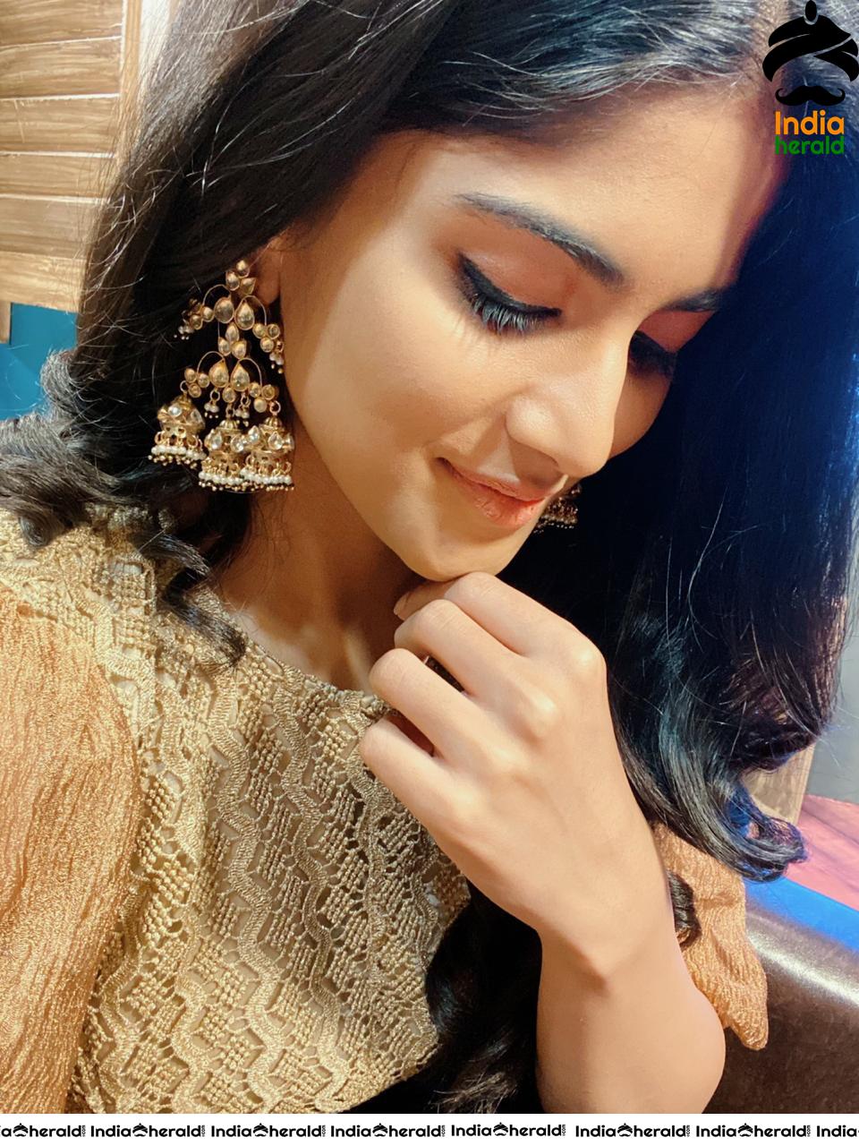 Megha Akash Shows Off her Ear Rings in these Photos