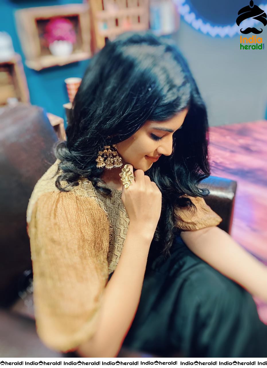 Megha Akash Shows Off her Ear Rings in these Photos