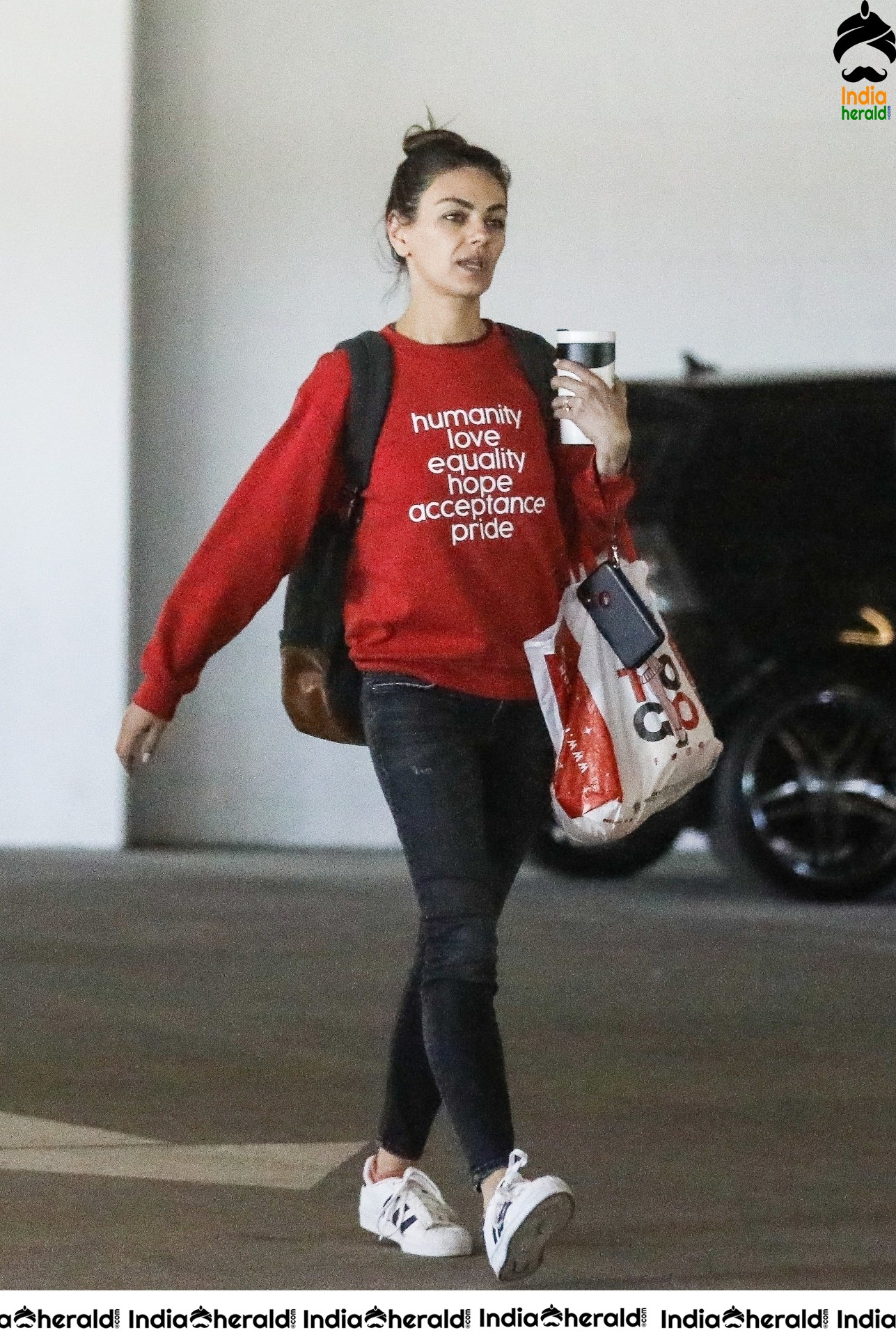 Mila Kunis Caught by Paparazzi while she completes shopping at West Hollywood