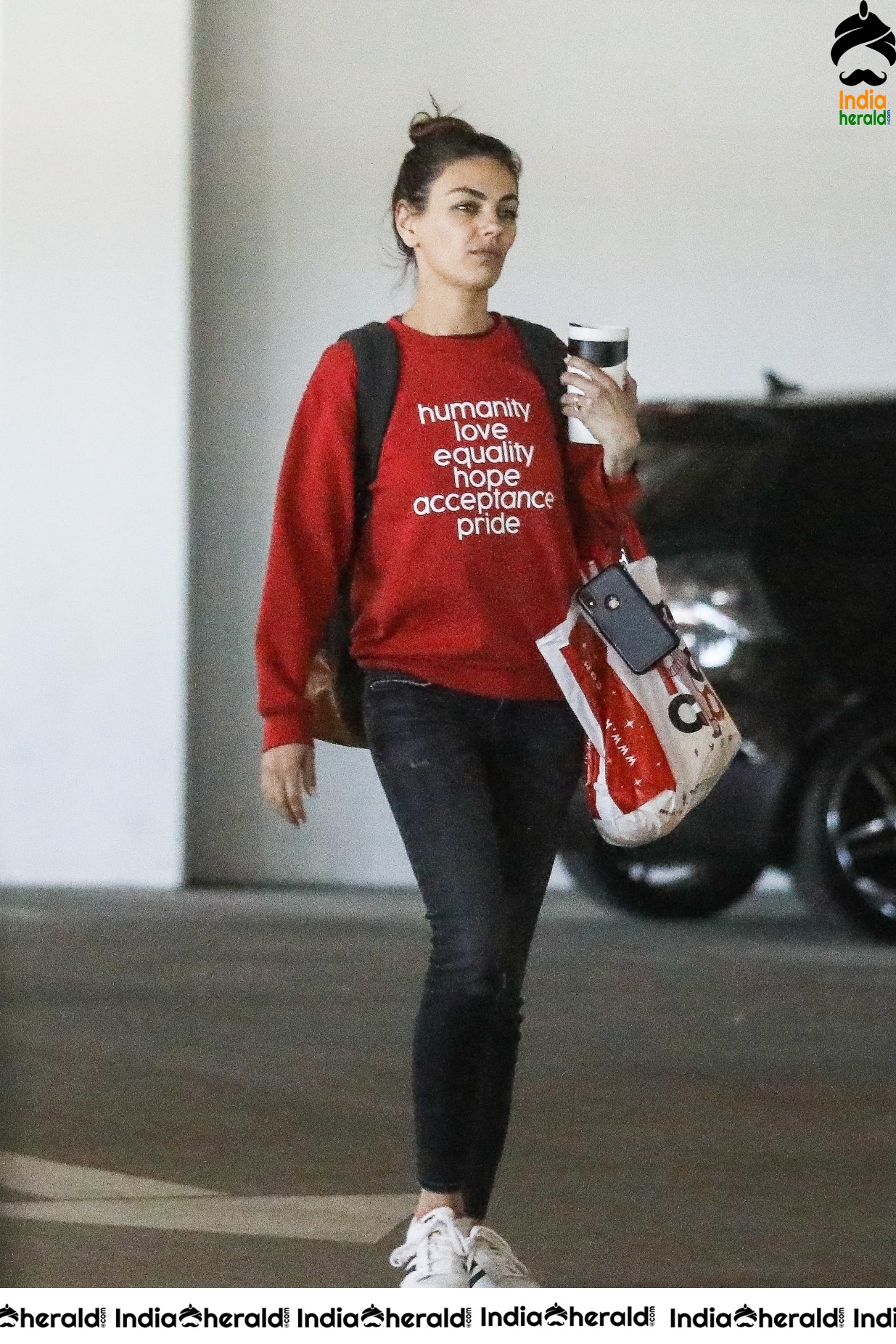 Mila Kunis Caught by Paparazzi while she completes shopping at West Hollywood