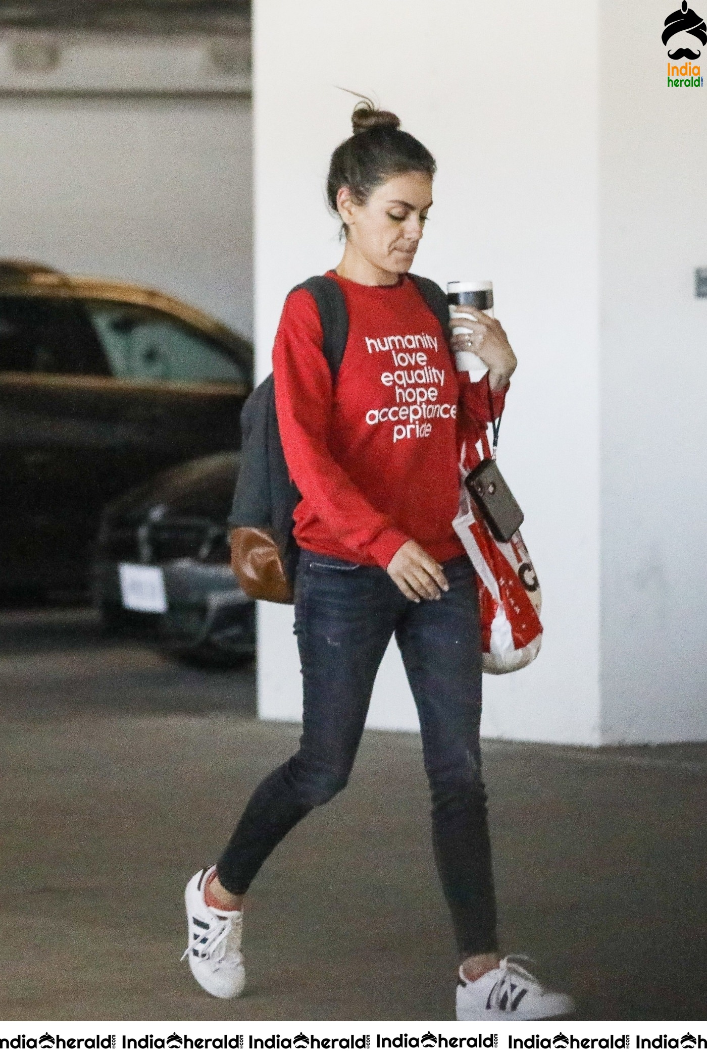 Mila Kunis Caught by Paparazzi while she completes shopping at West Hollywood