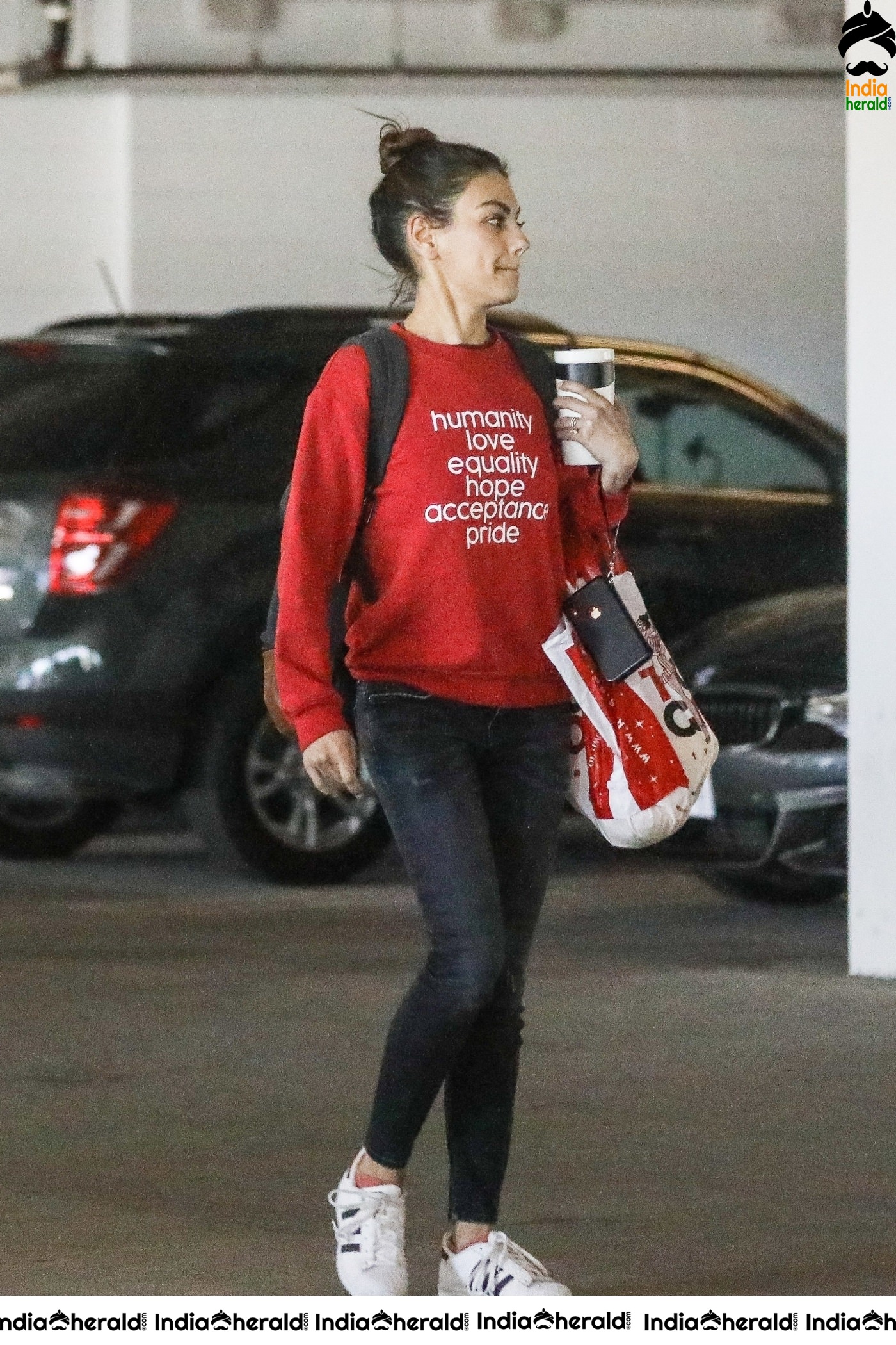 Mila Kunis Caught by Paparazzi while she completes shopping at West Hollywood