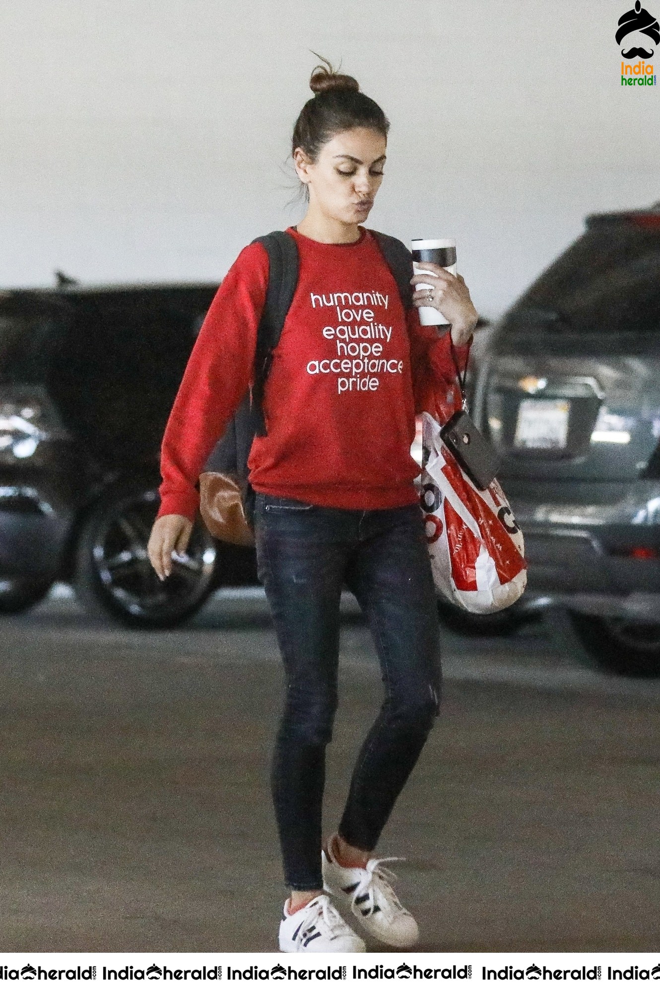 Mila Kunis Caught by Paparazzi while she completes shopping at West Hollywood