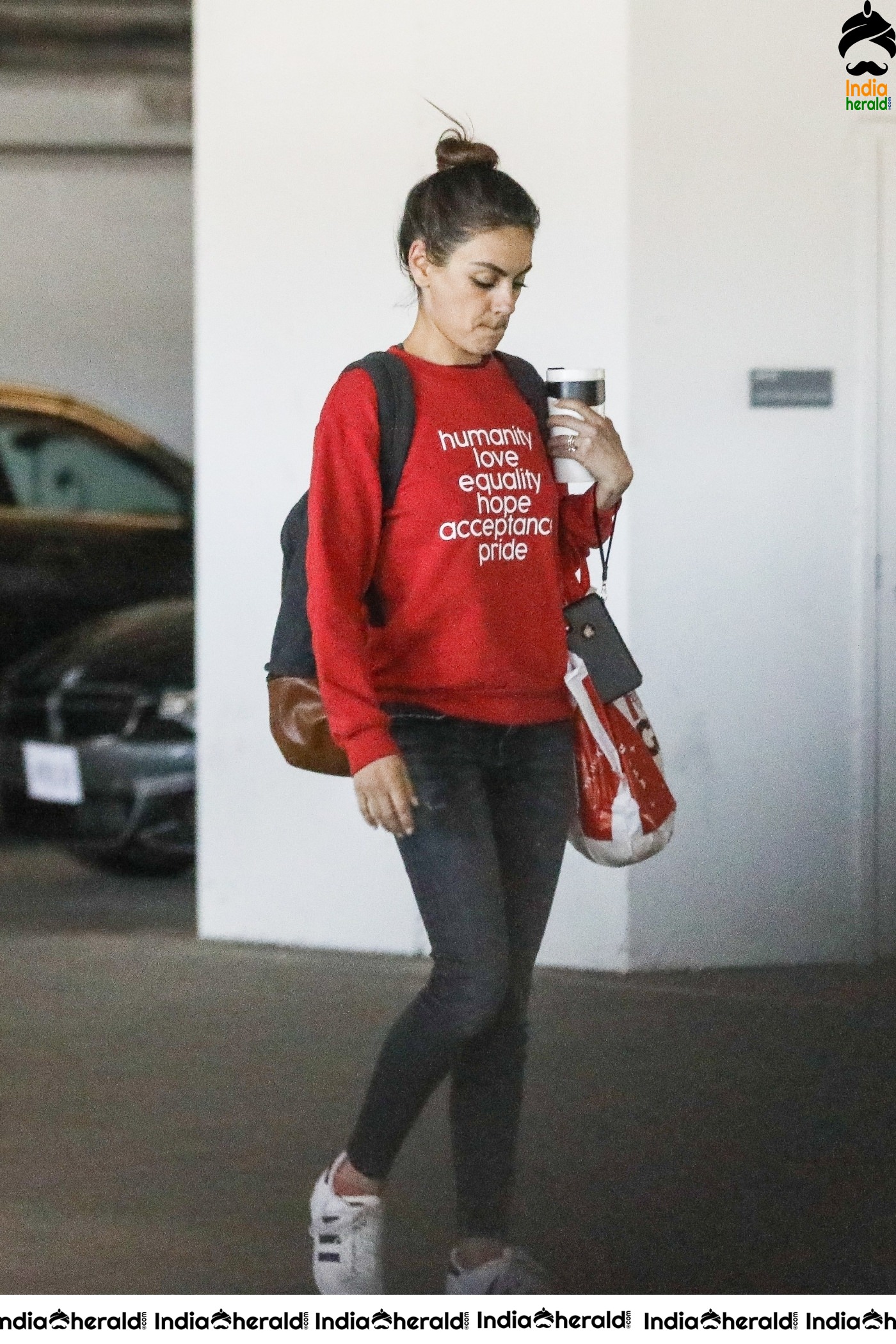 Mila Kunis Caught by Paparazzi while she completes shopping at West Hollywood