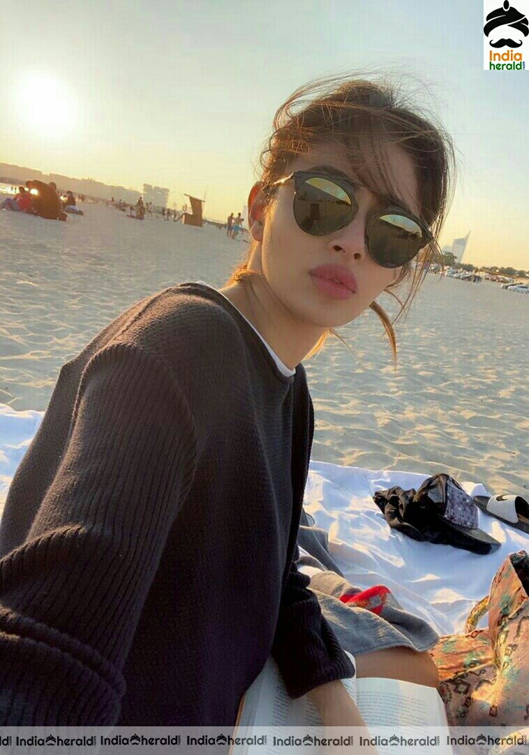 Mouni roy Cute Black Dress Stills In Beach