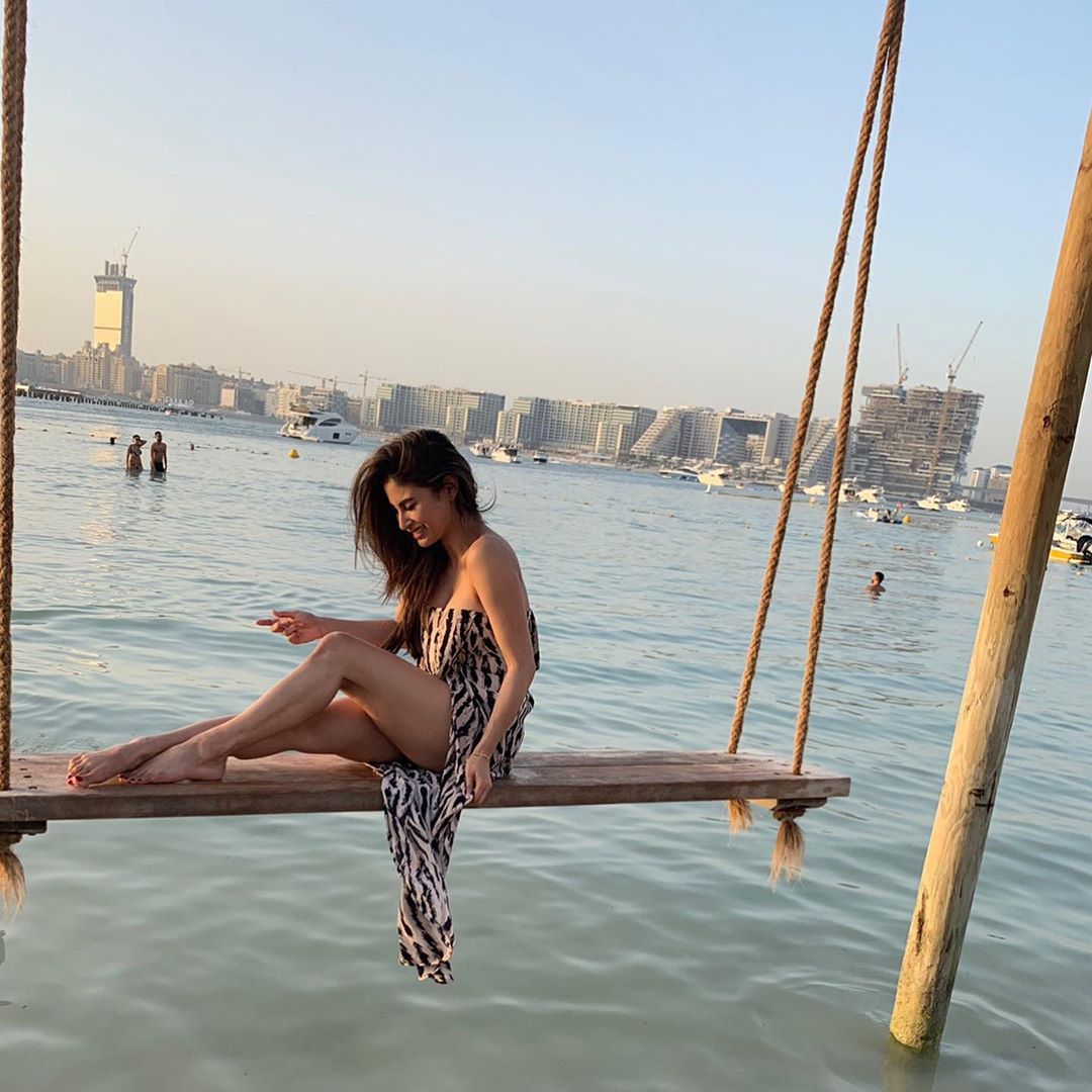 Mouni Roy Swinging Over The Waves And Shows Her Thighs