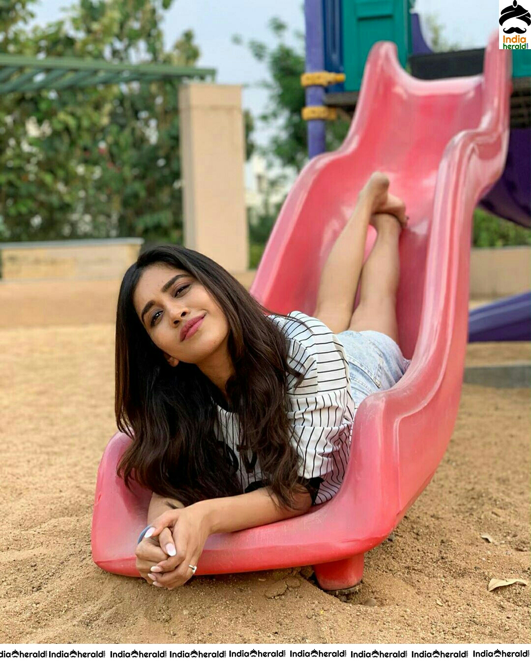 Nabha Natesh Hot Thighs Show While Playing At The Park
