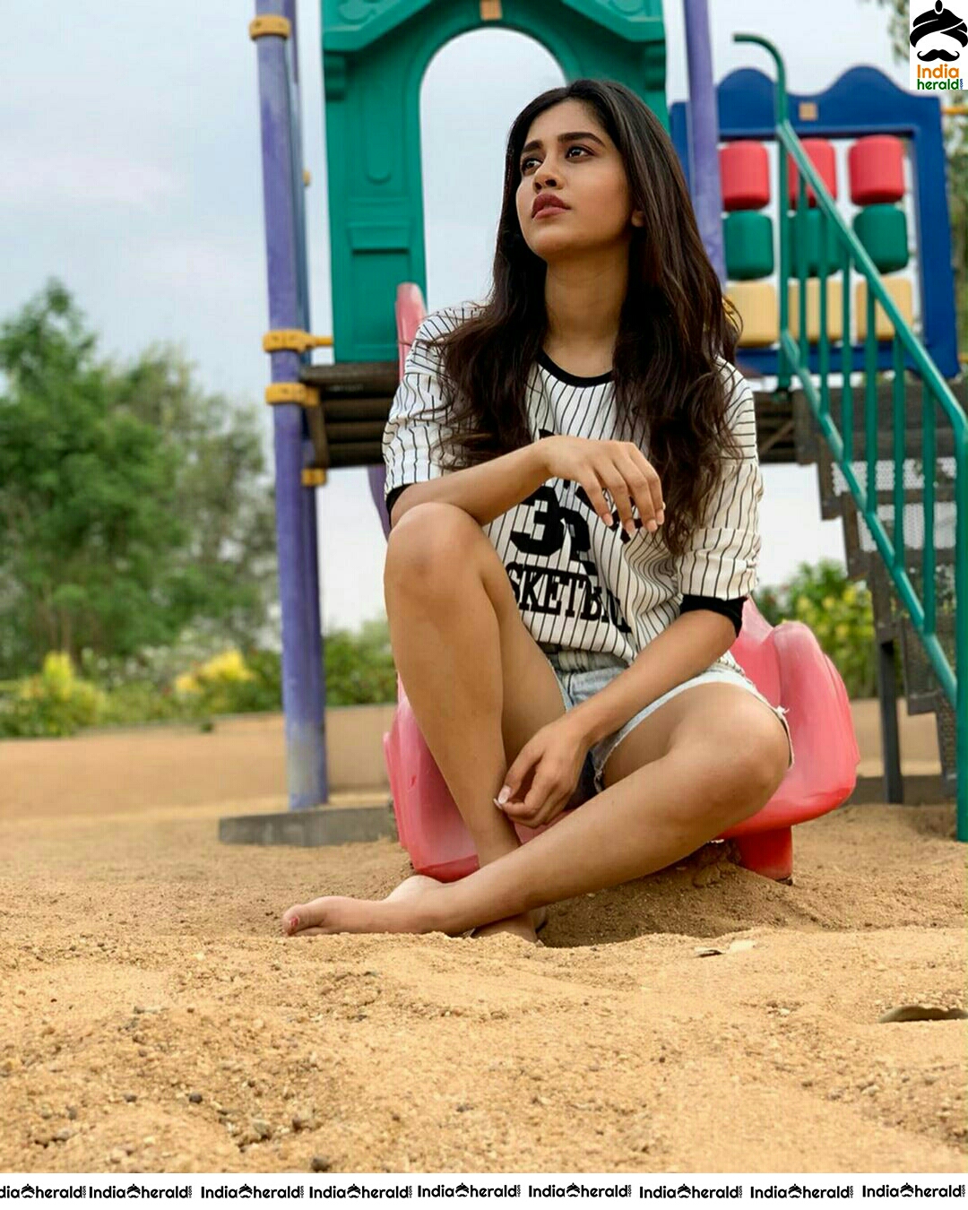 Nabha Natesh Hot Thighs Show While Playing At The Park