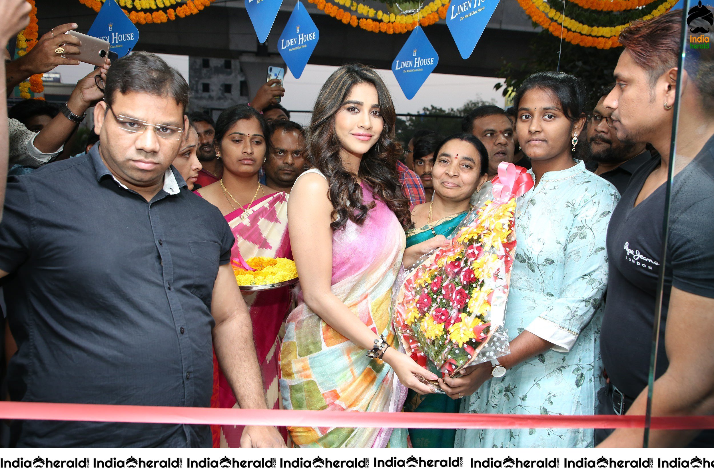 Nabha natesh in Sleeveless Blouse and Saree Inaugurated Linen House at Nizampet Set 1