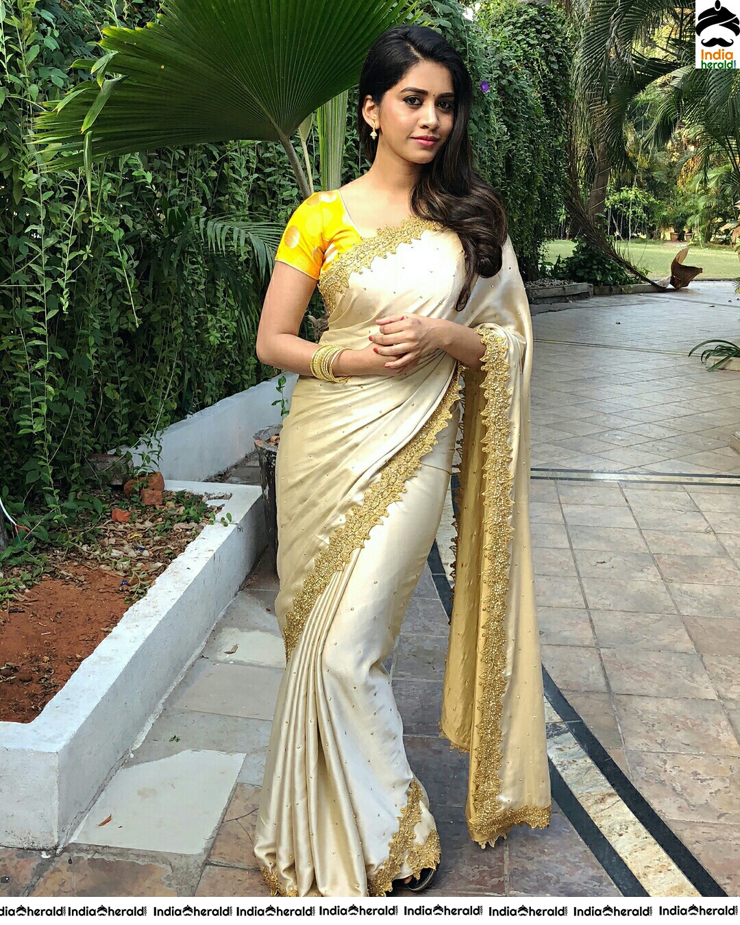 Nabha Natesh Looks So Cute In Golden Saree Stills