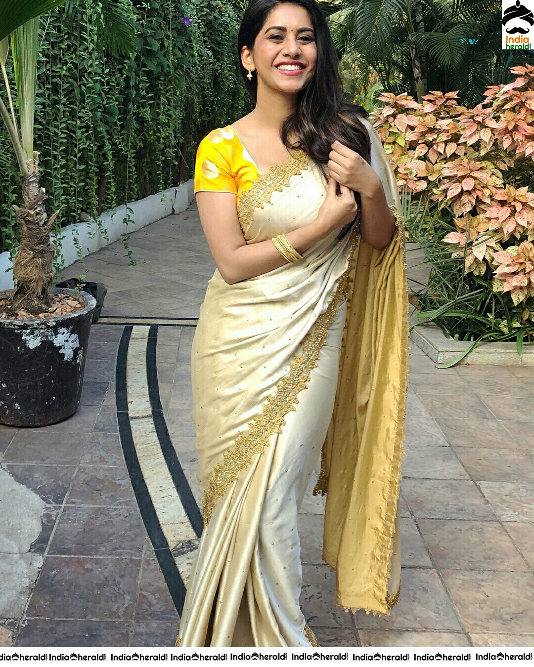 Nabha Natesh Looks So Cute In Golden Saree Stills