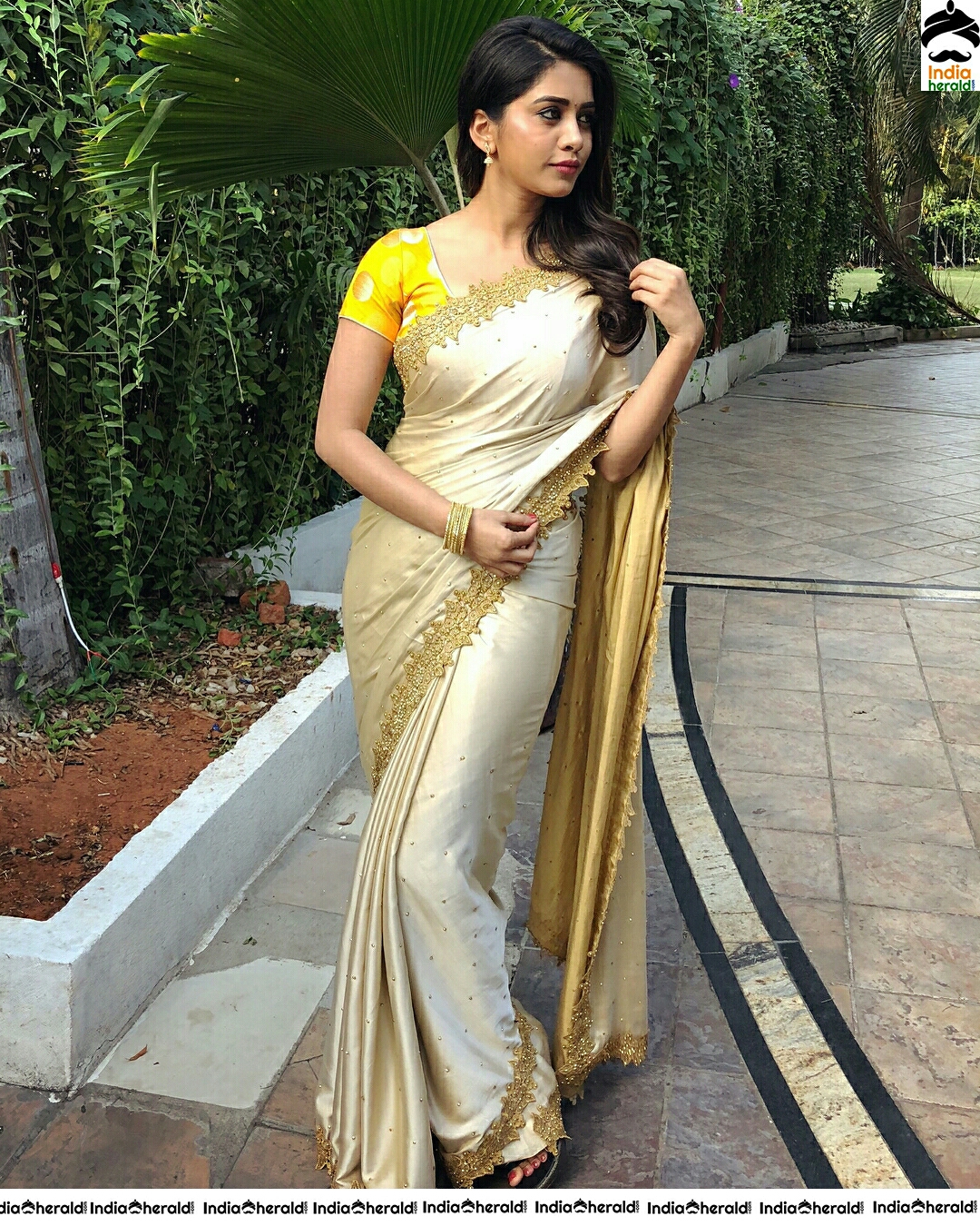 Nabha Natesh Looks So Cute In Golden Saree Stills