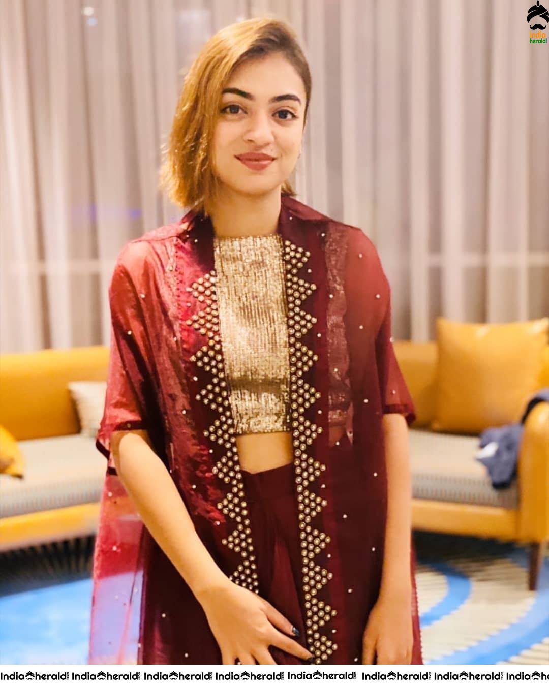 Nazriya Nazim exposes her Sexy waistline and Slim thighs in these Hot Photos