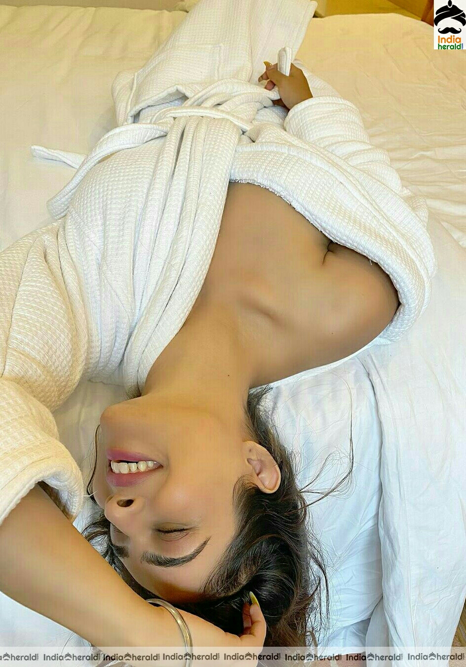 Neha Malik Hot In Bath Robe Stills