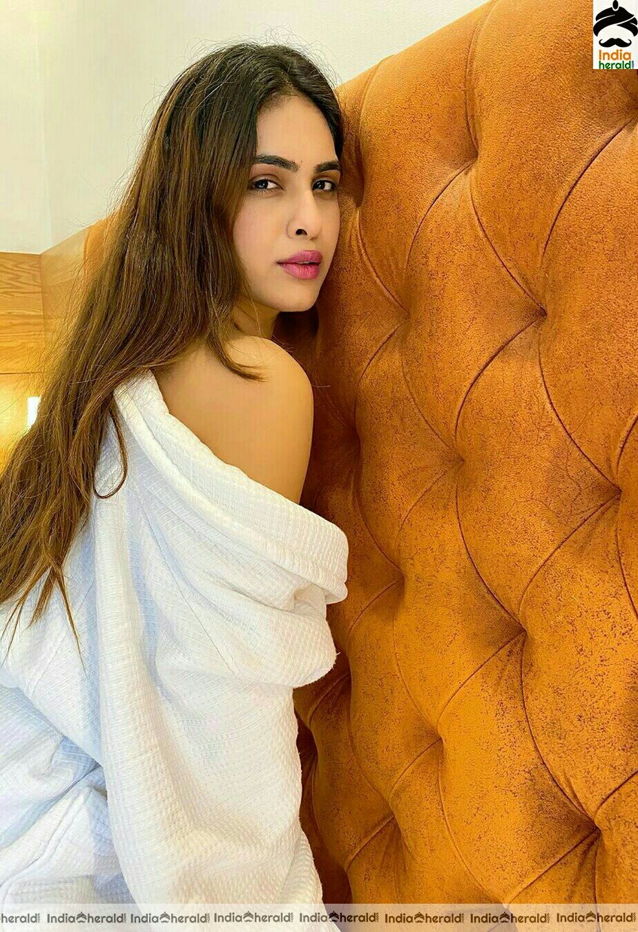 Neha Malik Hot In Bath Robe Stills