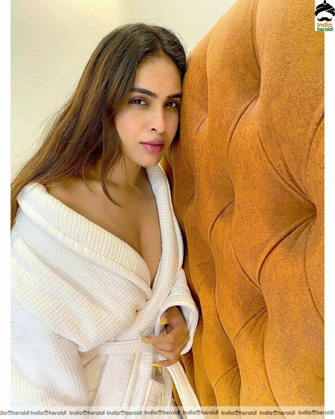 Neha Malik Hot In Bath Robe Stills