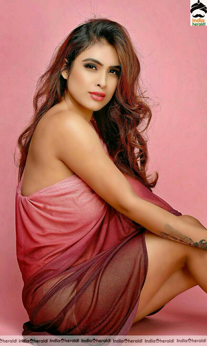 Neha Malik Hot Stills In Pink Dress
