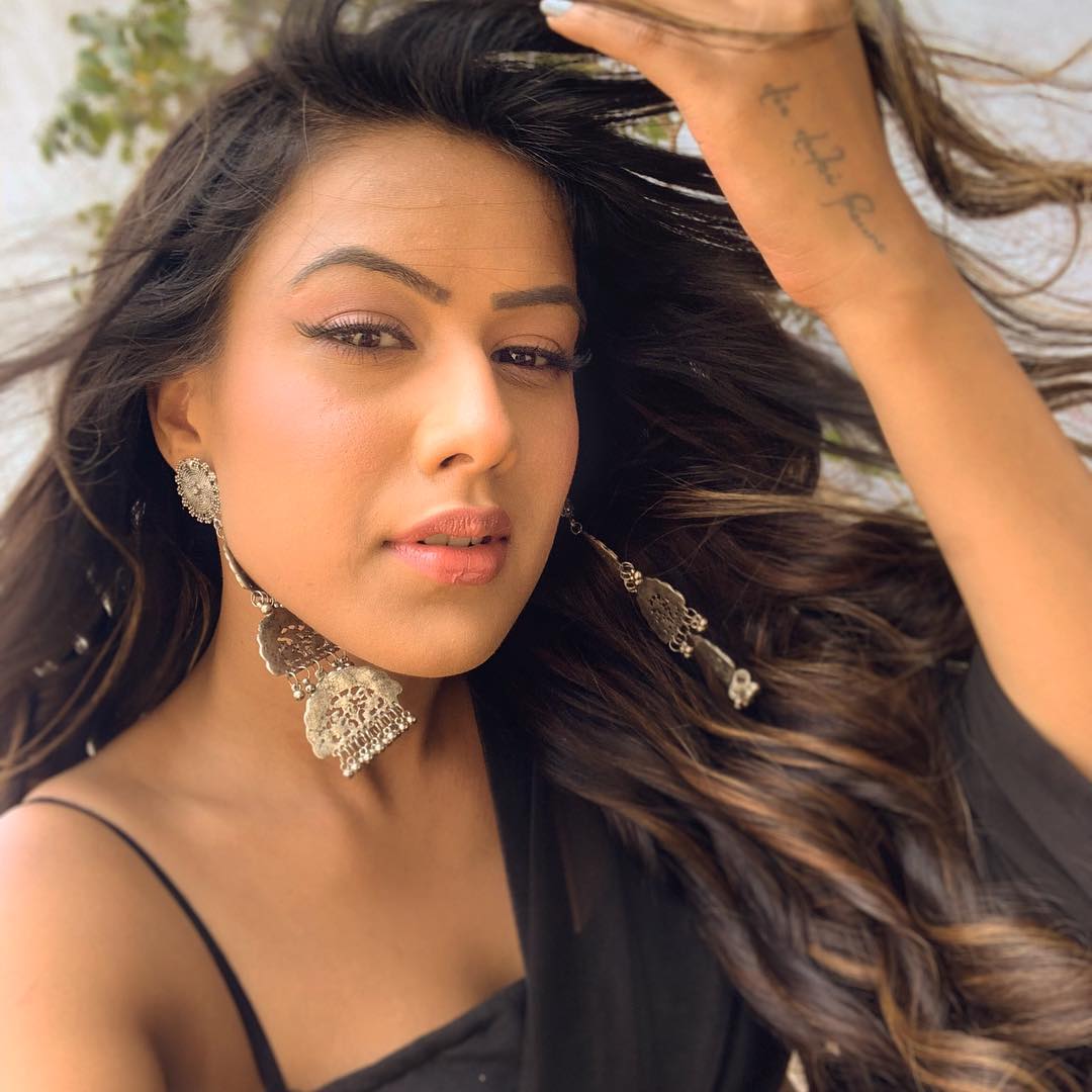 Nia Sharma Dizzling Hot Saree Photos