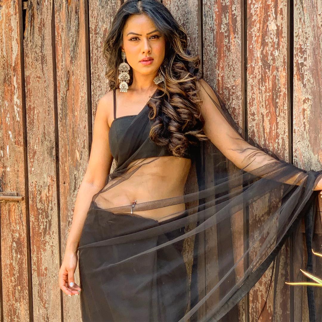 Nia Sharma Dizzling Hot Saree Photos