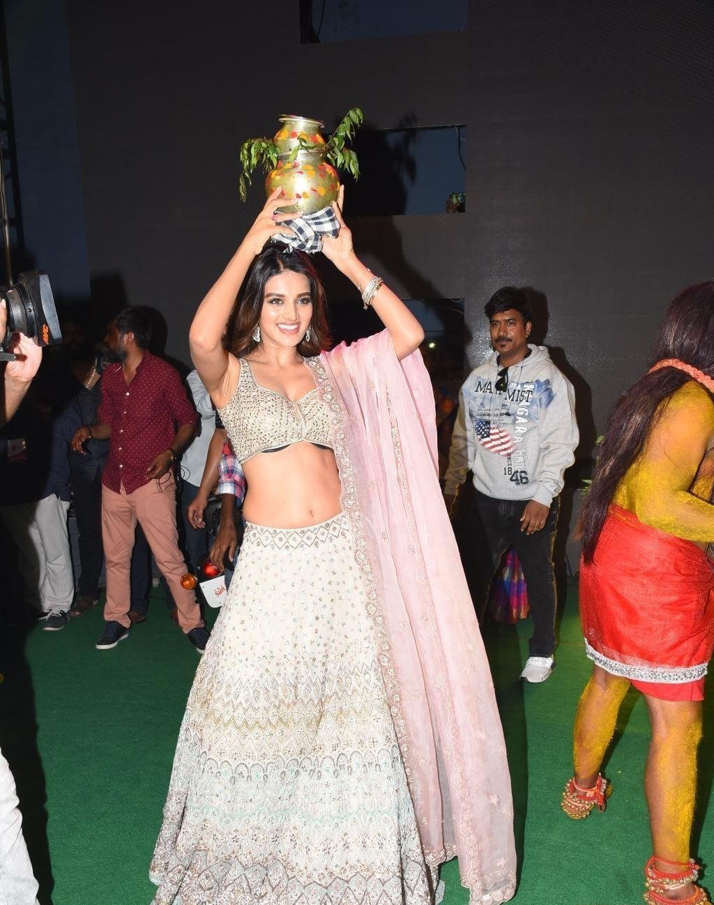 Niddhi Agerwal Hot Show At Ismart Shankar Movie Bonalu Public Event