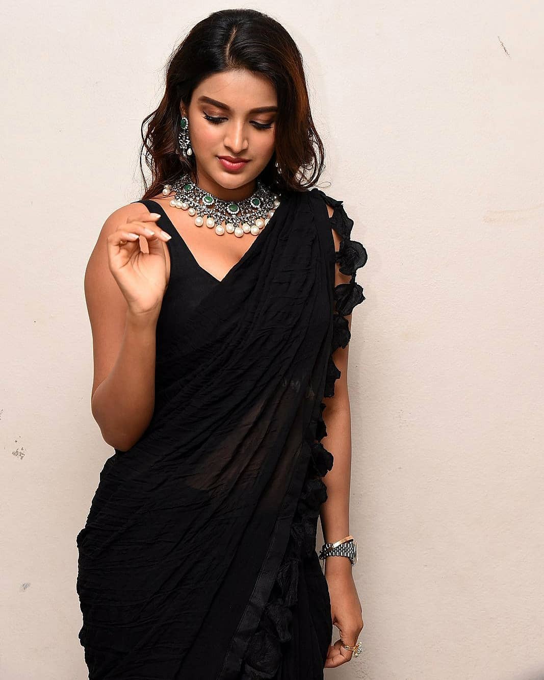 Niddhi Agerwal Showing Her Sexy Waist InTransparent Black Saree