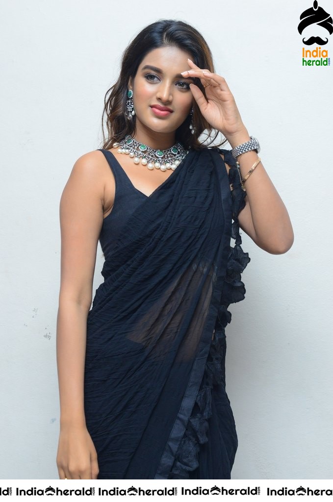 Nidhhi Agerwal Throwback Hot Photos in Sleeveless Blouse and Transparent Saree
