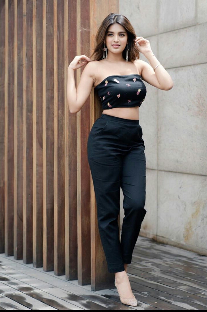 Nidhhi Spices The Mood In A sleeveless Cut Blouse And Pant