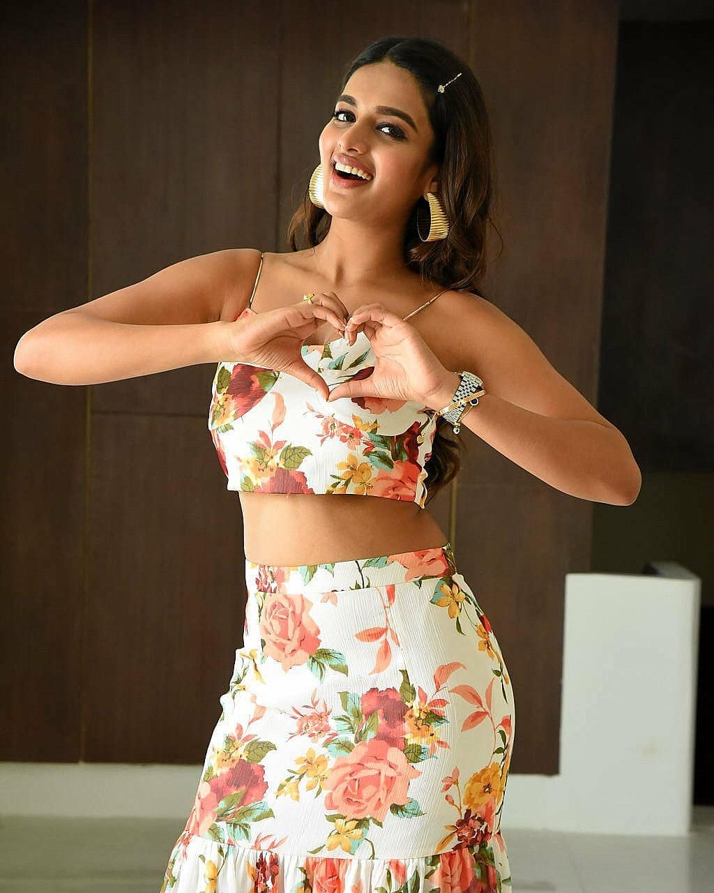 Nidhhi Agerwal Shows Hot Waist Line In Floral Dress HD Photos