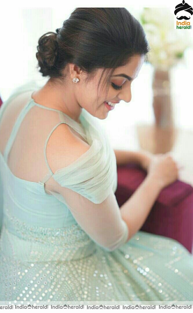 Nikhila cute photos green net dress stills