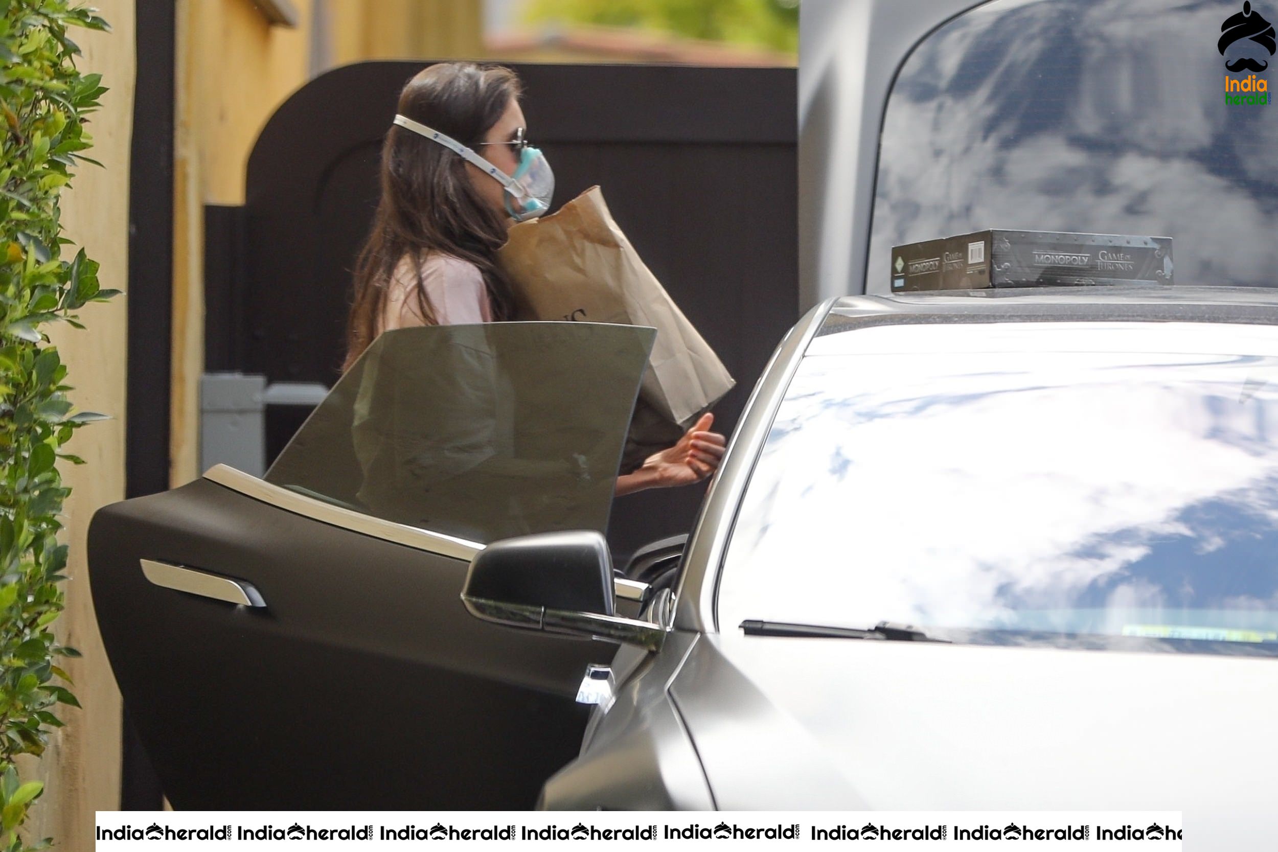 Nina Dobrev Out wearing a surgical mask due to Corona Virus in Los Angeles