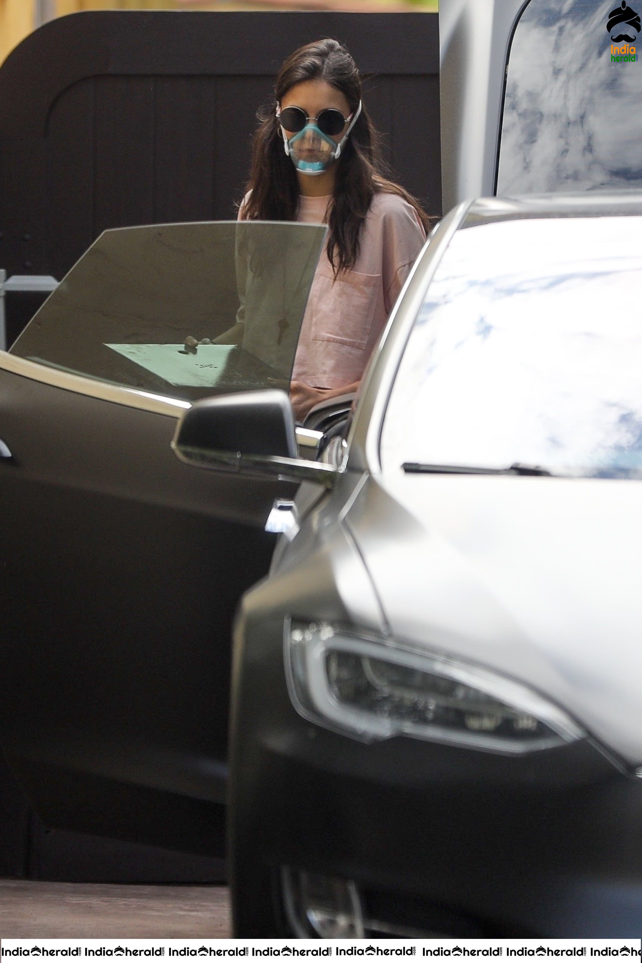 Nina Dobrev Out wearing a surgical mask due to Corona Virus in Los Angeles