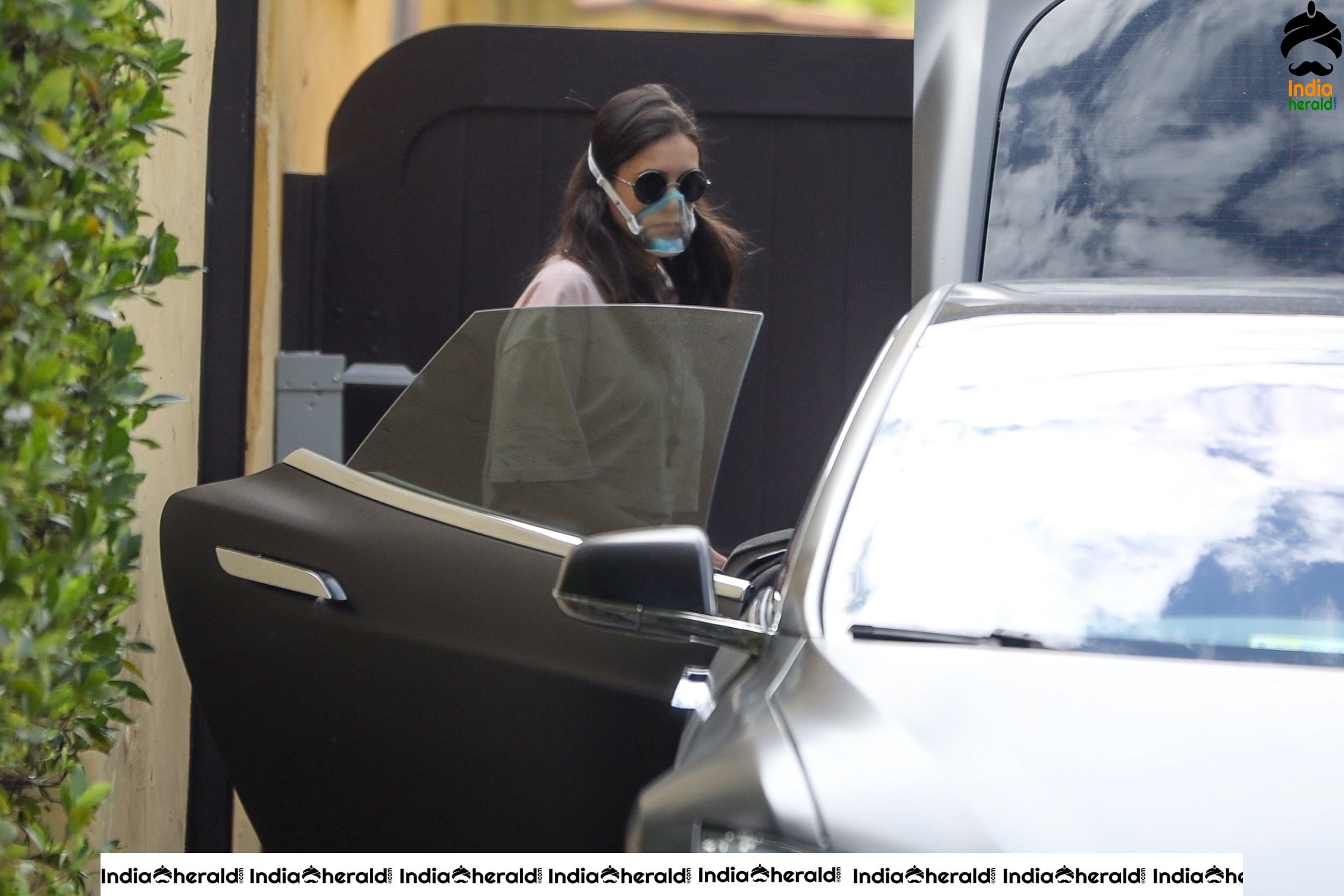 Nina Dobrev Out wearing a surgical mask due to Corona Virus in Los Angeles