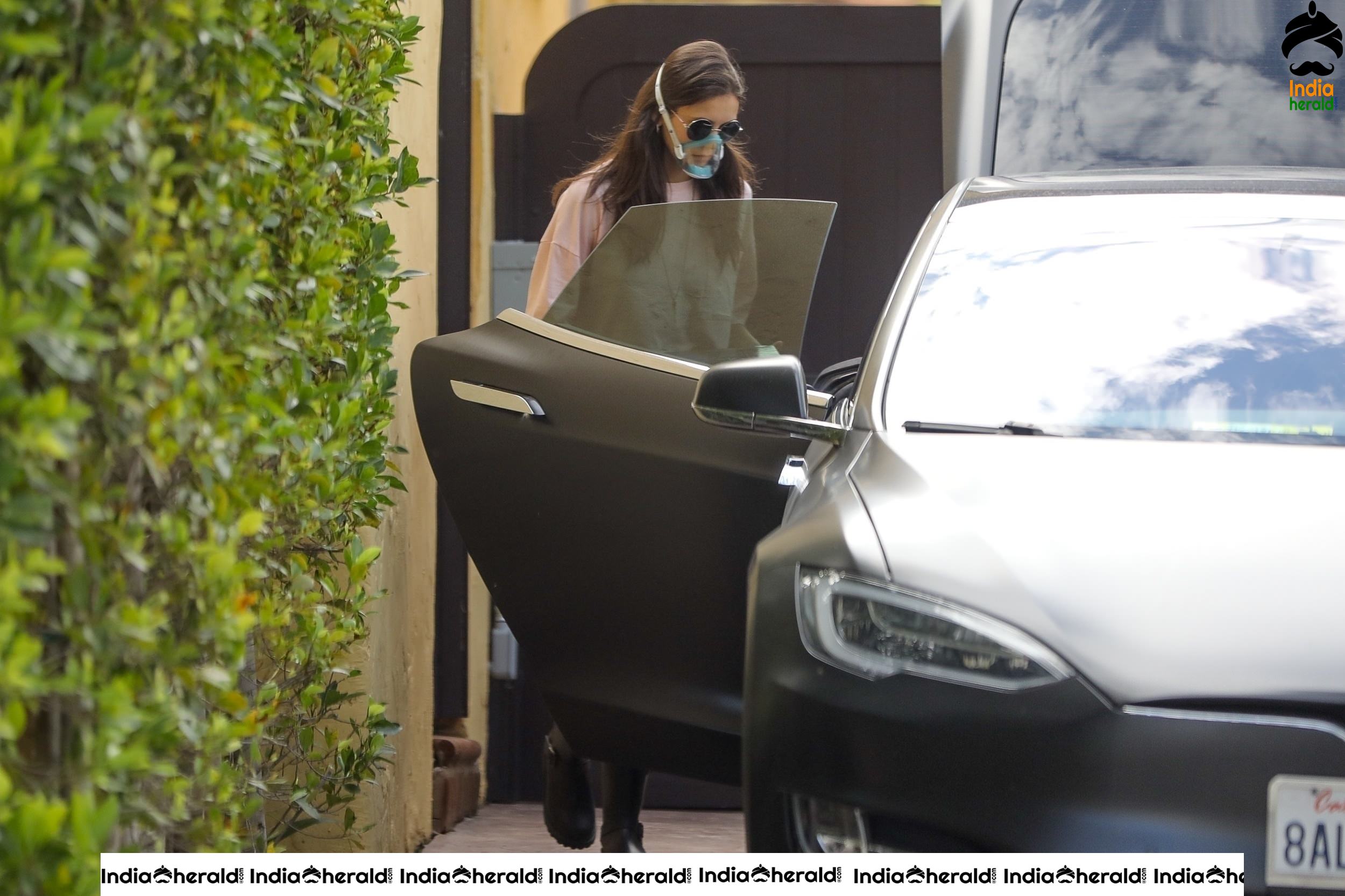 Nina Dobrev Out wearing a surgical mask due to Corona Virus in Los Angeles