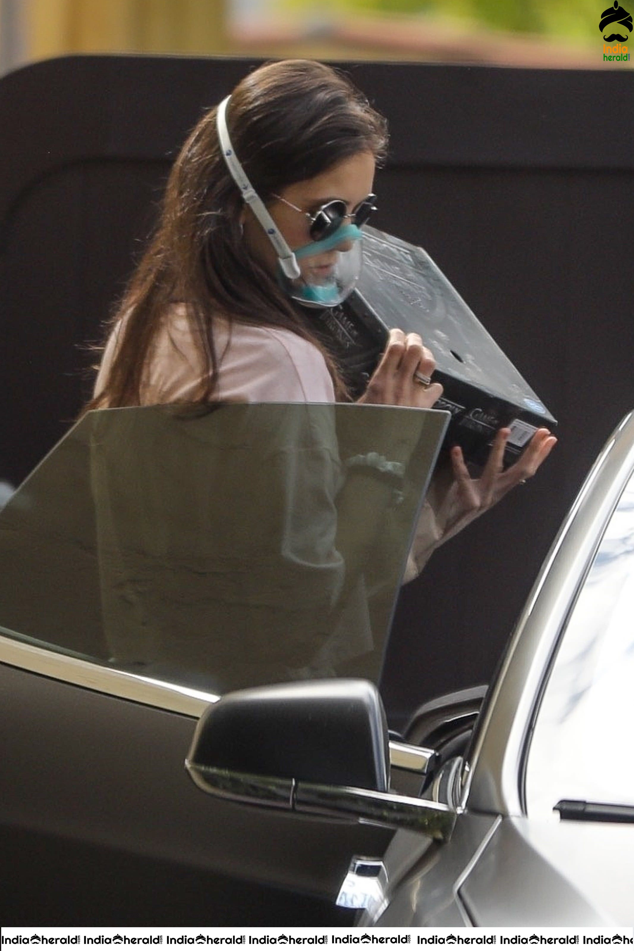 Nina Dobrev Out wearing a surgical mask due to Corona Virus in Los Angeles