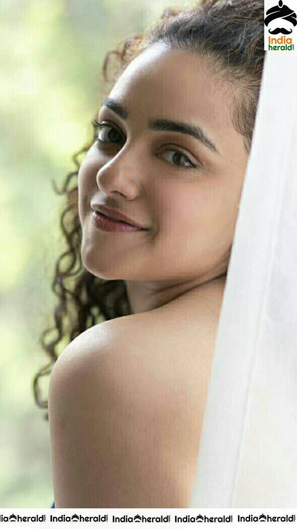 Nithya Menon Adorable And Hot Photoshoot