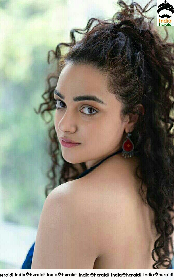 Nithya Menon Adorable And Hot Photoshoot