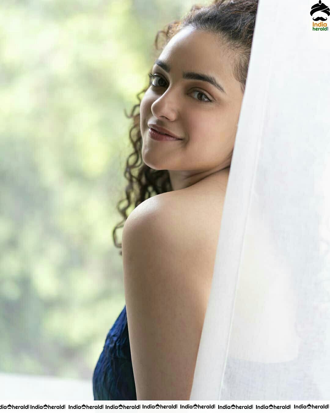 Nithya Menon Adorable And Hot Photoshoot