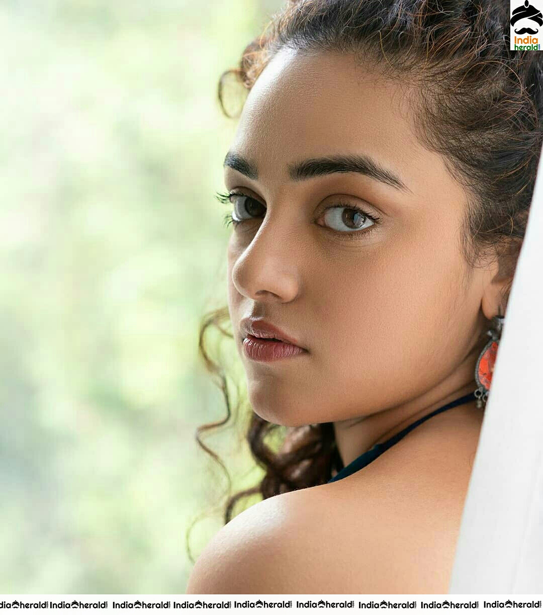 Nithya Menon Adorable And Hot Photoshoot