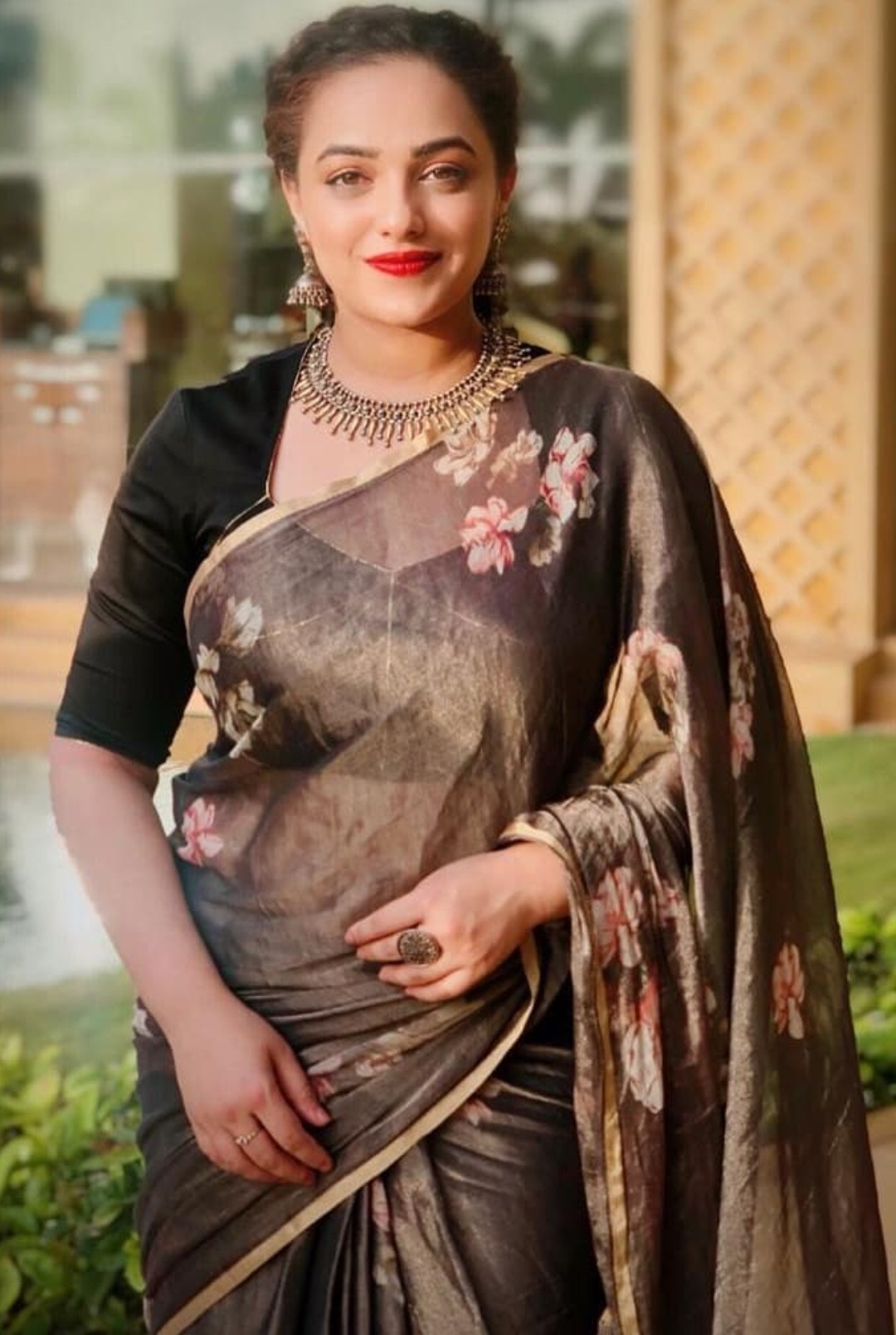 Nithya Menon Hot Photos In A Transparent Saree