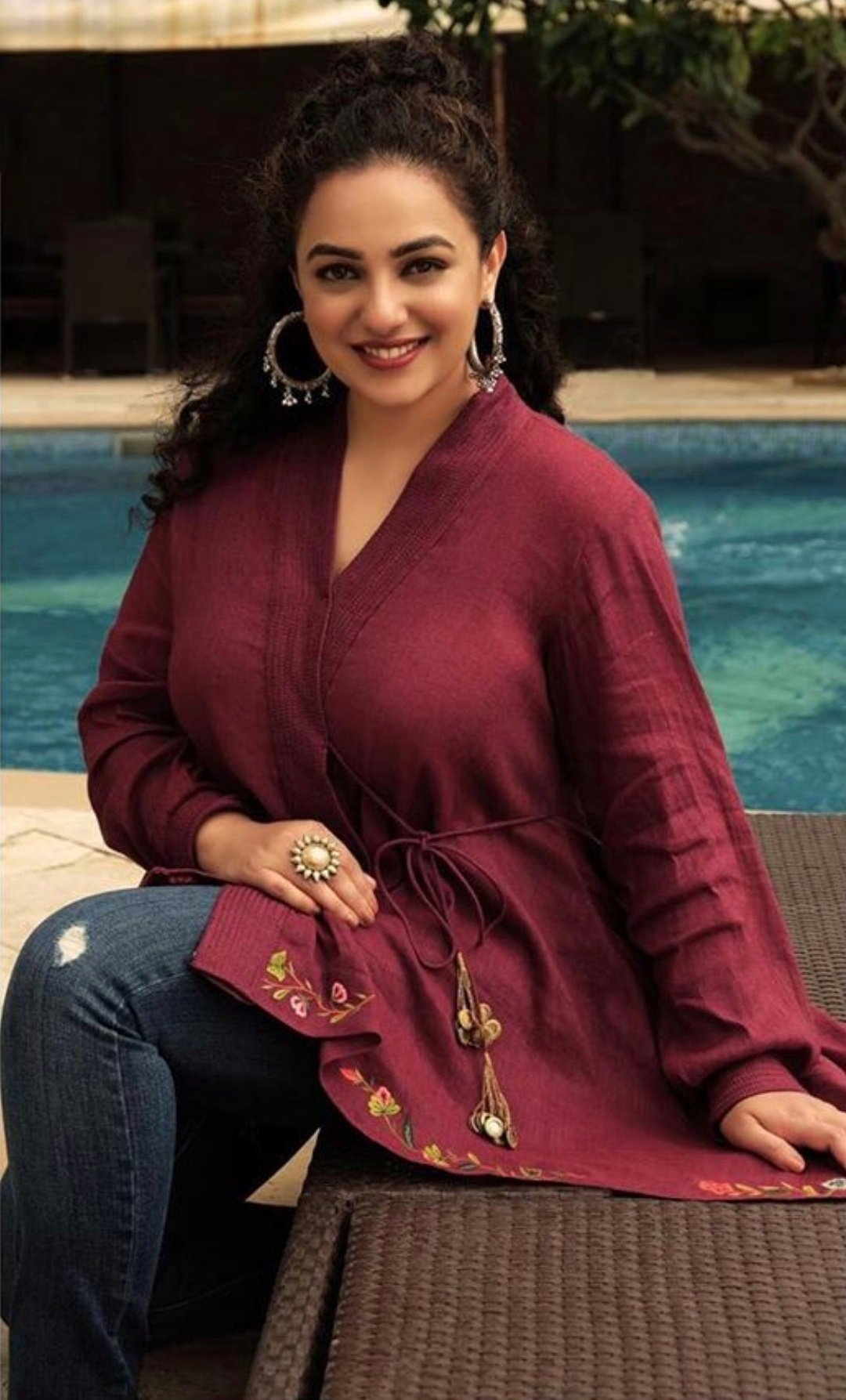 Nithya Menon Oozing Hotness In A Maroon Tight Dress