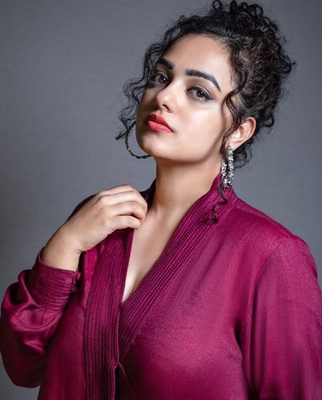 Nithya Menon Oozing Hotness In A Maroon Tight Dress