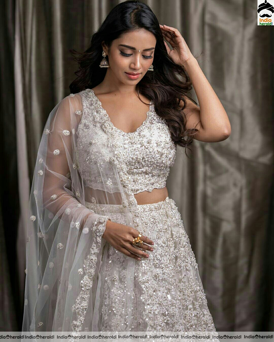 Nivetha Pethuraj cute and Hot White Glitter Dress stills